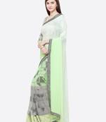 Green printed georgette saree with blouse