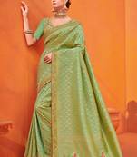Green embroidered silk saree with blouse