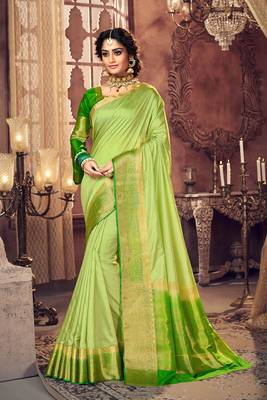 Green woven Silk Blend saree with blouse 1