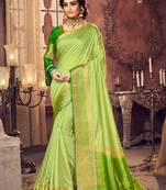 Green woven Silk Blend saree with blouse