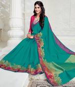 Green woven raw silk saree with blouse