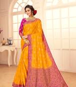 Yellow woven Silk Blend saree with blouse
