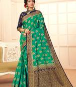 Green woven Silk Blend saree with blouse