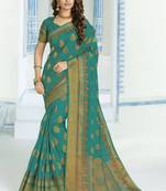 Green woven raw silk saree with blouse