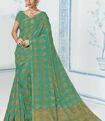 Green woven raw silk saree with blouse