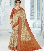 Beige woven raw silk saree with blouse