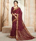 Maroon woven Silk Blend saree with blouse