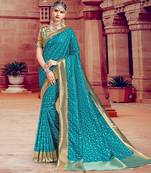 Green woven Silk Blend saree with blouse