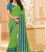 Light green printed satin saree with blouse