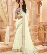 Cream printed satin saree with blouse
