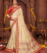 Cream embroidered silk blend saree with blouse