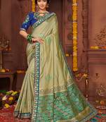 Olive embroidered silk blend saree with blouse