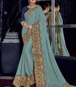 Grey embroidered georgette saree with blouse