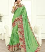 Green embroidered chiffon saree with blouse