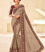 Brown embroidered chiffon saree with blouse