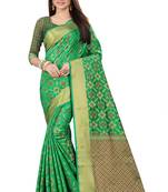 Green woven silk blend saree with blouse