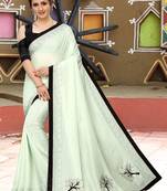 Cream plain silk saree with blouse
