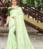 Parrot green plain silk saree with blouse