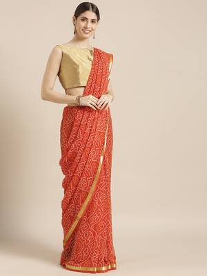 Kimisha Women's Orange Color Georgette Bandhani Print Saree 1