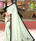 Light green embroidered art silk saree with blouse