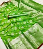 Light green woven silk saree with blouse