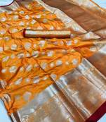 Orange woven silk saree with blouse