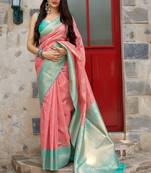 Pink woven Banarasi silk blend saree with blouse