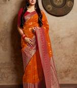 Orange woven banarasi silk saree with blouse