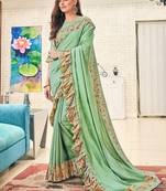 Green plain silk saree with blouse