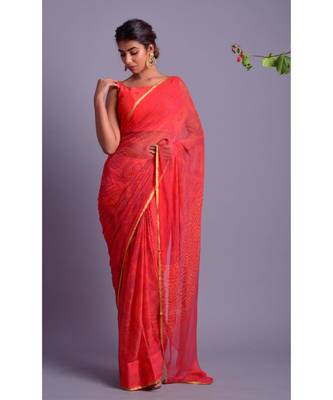 orange printed bandhej chiffon saree with blouse 1