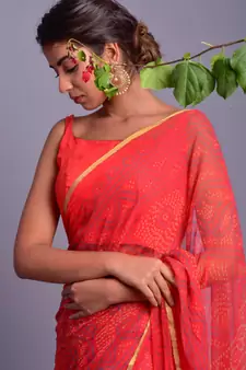 orange printed bandhej chiffon saree with blouse