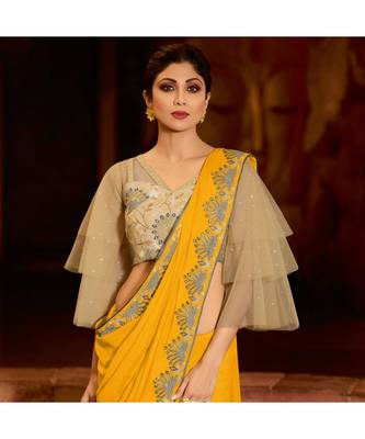Yellow embroidered Silk blend saree with blouse 4