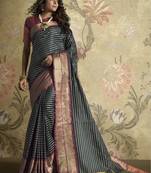 Black woven silk blend saree with blouse