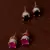 Ruby and Black Stone Embellished American Diamond Stud 216ED309