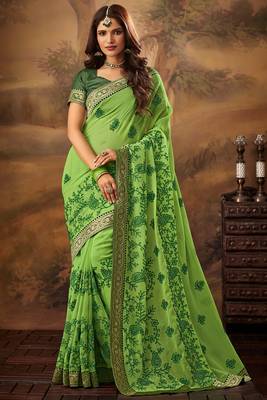 green embroidered chiffon saree with blouse 1