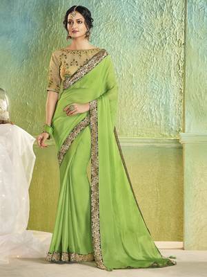 green embroidered chiffon saree with blouse 1