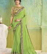 green embroidered chiffon saree with blouse