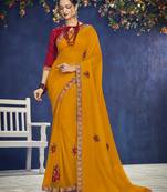 yellow embroidered chiffon saree with blouse