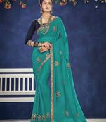 teal embroidered chiffon saree with blouse