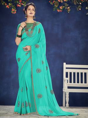 turquoise embroidered chiffon saree with blouse 1