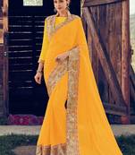 yellow embroidered chiffon saree with blouse