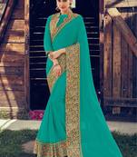 turquoise embroidered chiffon saree with blouse