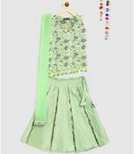 green block print choli with multi print lehnga