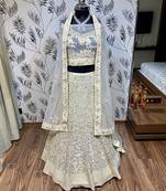 White Embroidered Net Semi Stitched Lehenga