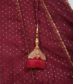 sleeveless  peplum choli with maroon net lehnga