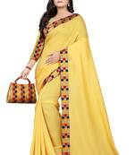 yellow plain tussar silk saree with blouse