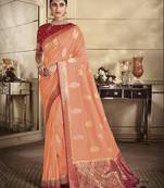 Peach woven banarasi silk saree with blouse
