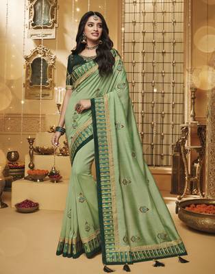 Green embroidered silk blend saree with blouse 1