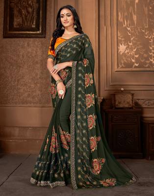 Dark green printed georgette saree with blouse 1