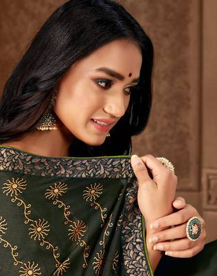 Dark green printed georgette saree with blouse 2